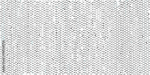 Close up of a textured woven fabric with a repeating diamond pattern