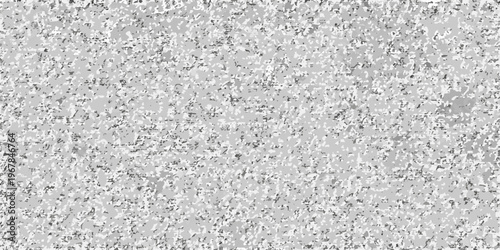 Abstract gray speckled texture resembling grainy concrete or static