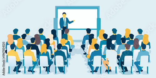 A presenter addresses a large audience seated in a conference hall