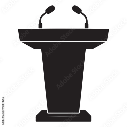 A black and white image of a podium with two microphones