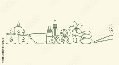 Relaxing spa set with candles essential oils rolled towels smooth stones and incense sticks.