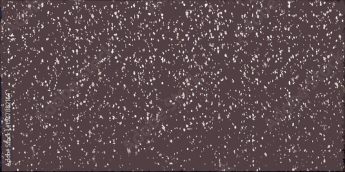 Abstract dark brown texture with scattered lighter speckles throughout