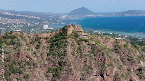 Peak of Diamond Head with people overlooking Waikiki Beach aerial view, Honolulu city , Hawaii. Wide angle view	

