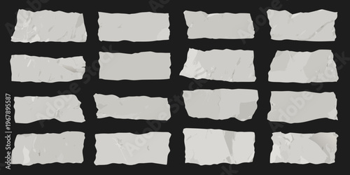 Collection of torn and crumpled white paper pieces on black background