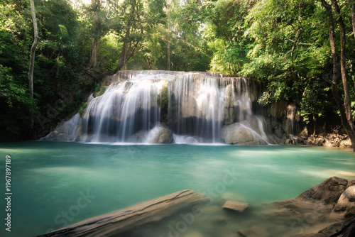 Erawan Waterfall Tier 2 at Wang Macha is a stunning natural attraction in Kanchanaburi Province, Thailand, refreshing and visually striking landscape. Surrounded by lush green forest and tropical foli