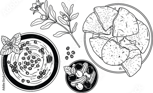 Hummus bowl with pomegranate seeds for Middle Eastern brunch