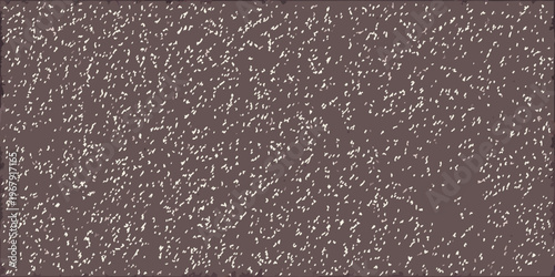 Close up of a textured brown surface resembling grainy material