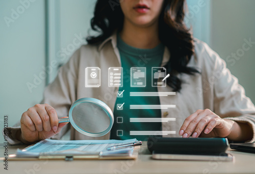 HR professional analyzing checklist and employee data with magnifying glass and digital interface, representing candidate evaluation, recruitment process, audit, and workflow management