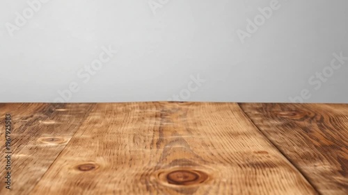 Wooden table with rustic brown surface.