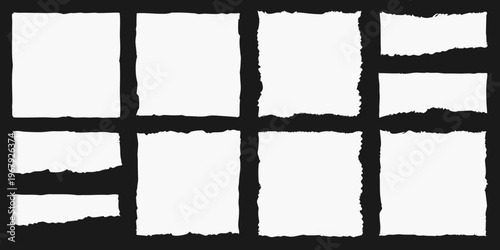 Arrangement of torn white paper pieces on a black background