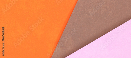 Abstract geometric composition with layered color paper texture in orange brown and pink tones