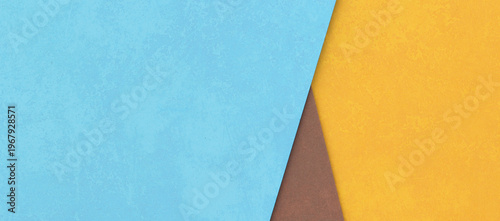 Abstract geometric composition with layered color paper texture in blue yellow and brown tones