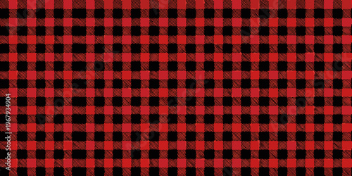 A repeating pattern of red and black checkered squares fills the frame