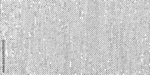 Close up of a textured monochromatic knit fabric with subtle sparkle