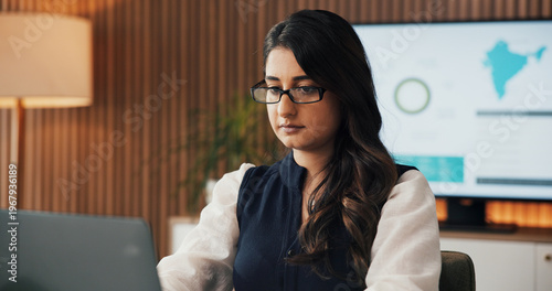 Obraz na plátně Business, woman and typing on laptop at desk for income report, market research or client email