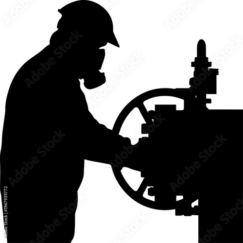 Black Silhouette of an Industrial Worker in Hard Hat and Respirator Operating a Large Valve Wheel