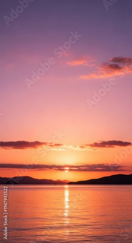 Sunset over water with vibrant colors in the sky
