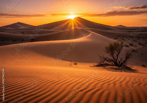 Sunset over a desert landscape with a mountain range