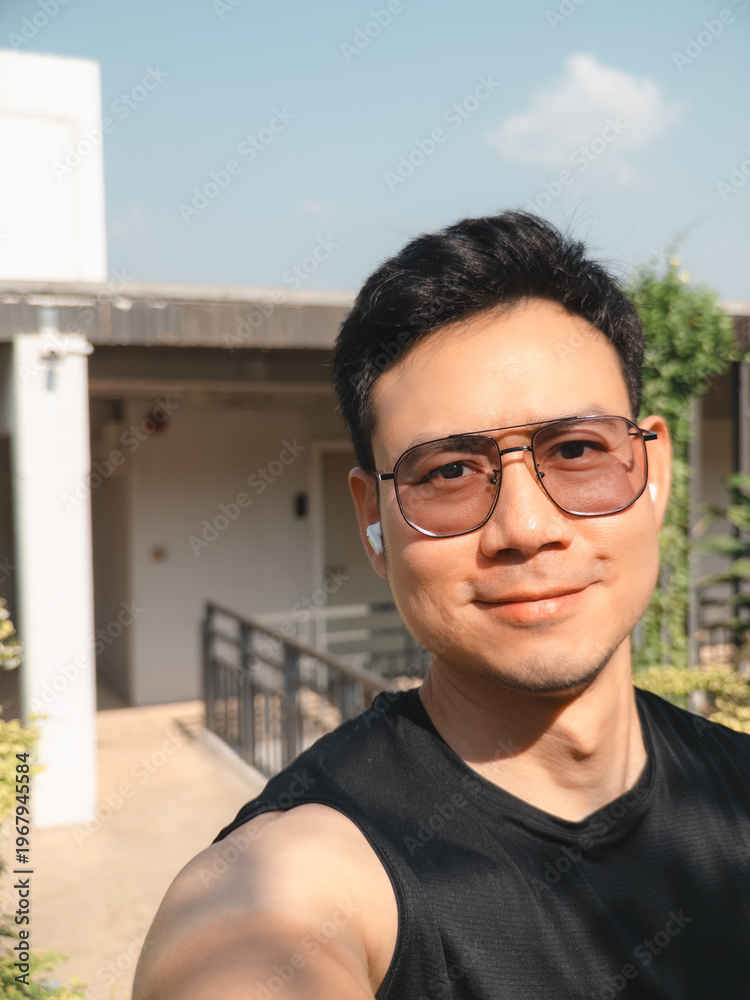 Obraz premium Bright summer afternoon with smiling man surrounded by beautiful nature