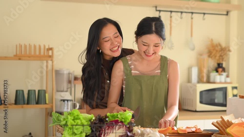 Couple cutting fresh papaya on a wooden board in a warm kitchen, preparing healthy food with natural ingredients.
