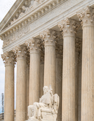 Authority of Law supreme court sculpture. Classical architecture heritage exterior. Law lex constitution judicial governance. Historic landmark justice.
