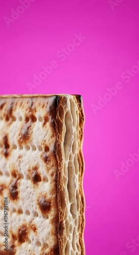 Close-up of Matzo on Pink Background.