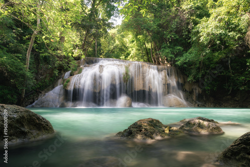 Εκτύπωση καμβά Erawan Waterfall Tier 2 at Wang Macha is popular travel destination in Kanchanaburi Province, Thailand, waterfall flows over limestone tiers into clear turquoise pool, surrounded by lush green forest