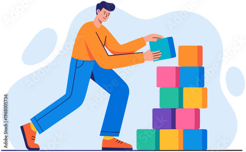 Man building colorful tower with blocks in an office setting