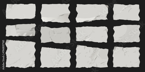 Collection of torn paper pieces arranged on a black background