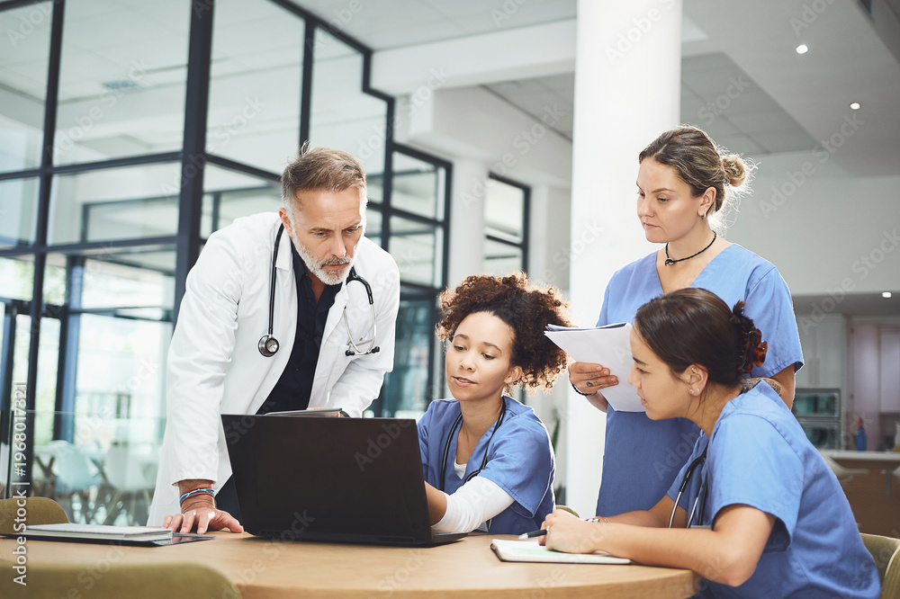Fototapeta premium People, doctor and nurse with medical discussion on laptop for meeting, planning or procedure in hospital. Group, healthcare workers or team with technology, documents or collaboration for surgery