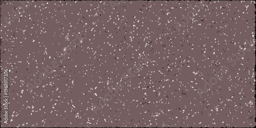 A speckled reddish brown textured background with a grainy appearance