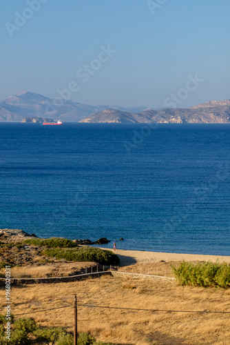 View of the empty sandy beach of Psathi in Ios Greece
