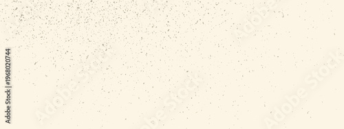 Minimal craft rice paper texture for scrapbook. Beige ecru bg with speckles, dots and flecks.