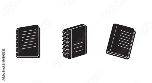 Three black notebooks with white lines on covers in different positions  isolated on white background