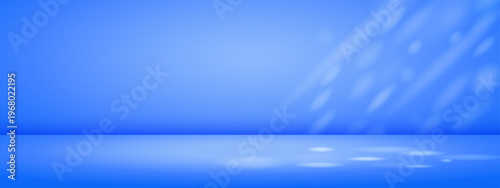 Blue studio background with sun rays. Limbo bg. Modern banner with empty space.