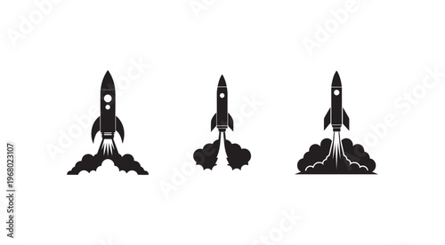 Three black silhouettes of rockets launching into space with smoke trails on white background  rocket ships blasting off into sky