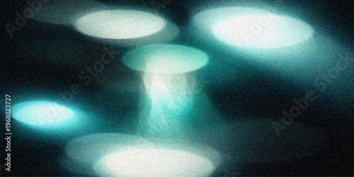 Abstract blue and dark light background with particles and motion design creates a shining galaxy texture backdrop for art and space loop backgrounds