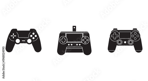 Three black video game controllers with various buttons and joysticks on white background for gaming and technology concepts  modern electronic devices