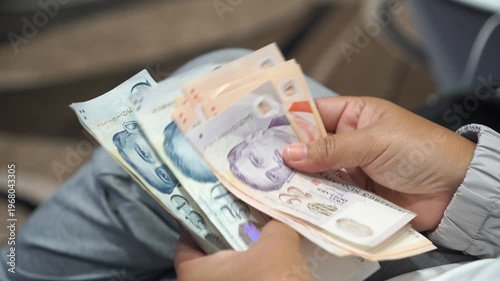 Banknote counting Singapore dollars SGD, Singapore money for payment