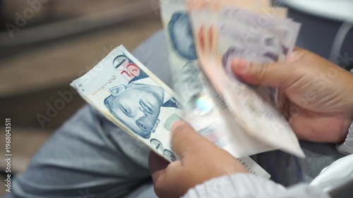Banknote counting Singapore dollars money, Singapore money for paying