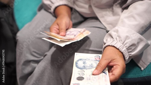 Singapore money banknote counting Singapore dollars SGD, War Financial