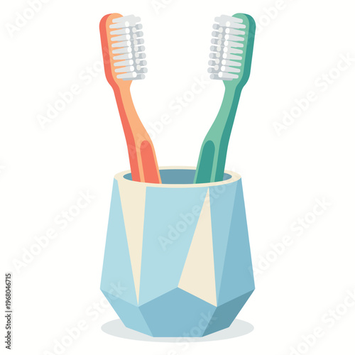 This image features two colorful toothbrushes, one orange and one green, nestled in a geometric blue holder, perfect for showcasing dental hygiene and modern design aesthetics.