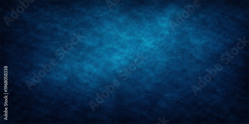 Abstract textured background of deep blue hues, reminiscent of the twilight sky or the ocean's depths, offering a sense of depth and mystery.