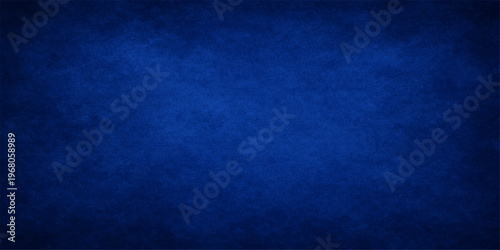 Abstract a captivating dark blue textured background, with elegant dark vignette effect. This background offers a sense of depth and style.