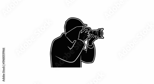 Silhouette of a person wearing a hat and holding a camera, focused on their work