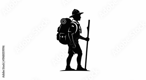 Silhouette of a person with a backpack and walking stick
