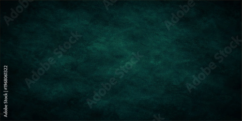 Abstract textured dark green background, simple and versatile backdrop suitable for a wide range of design and artistic projects.