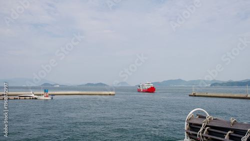 Bild auf Leinwand Ferry near Seto Inland Sea's port