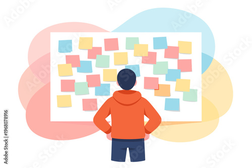 Person standing in front of a large board with many colorful sticky notes.