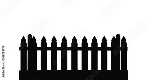 A black silhouette of a picket fence stretches across a bright white background providing contrast